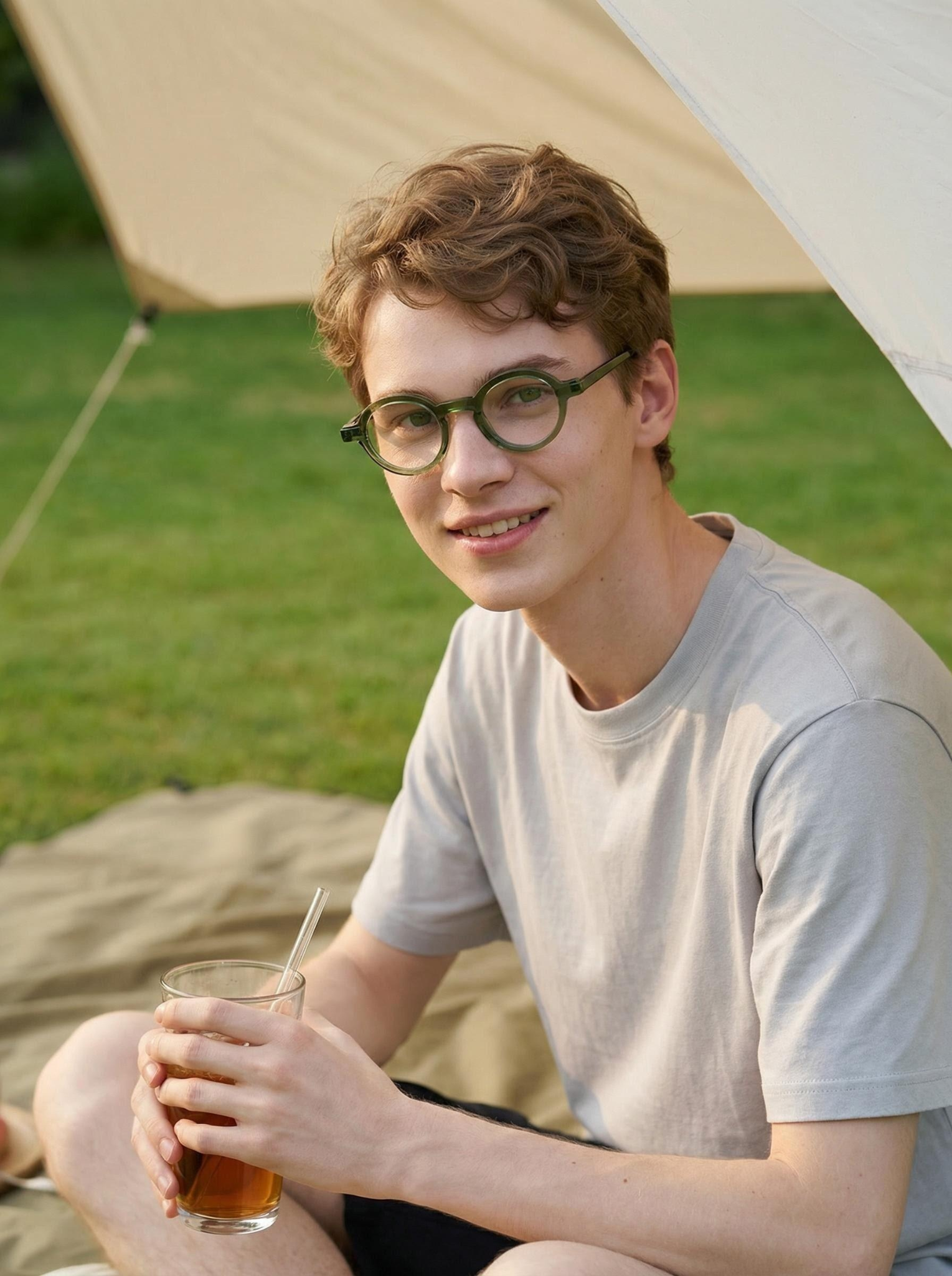 Model wearing a green Smartreach optical frame